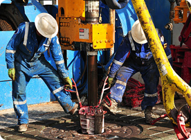 A group of people working on an oil rig.