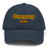 A navy blue hat with company man written on it.